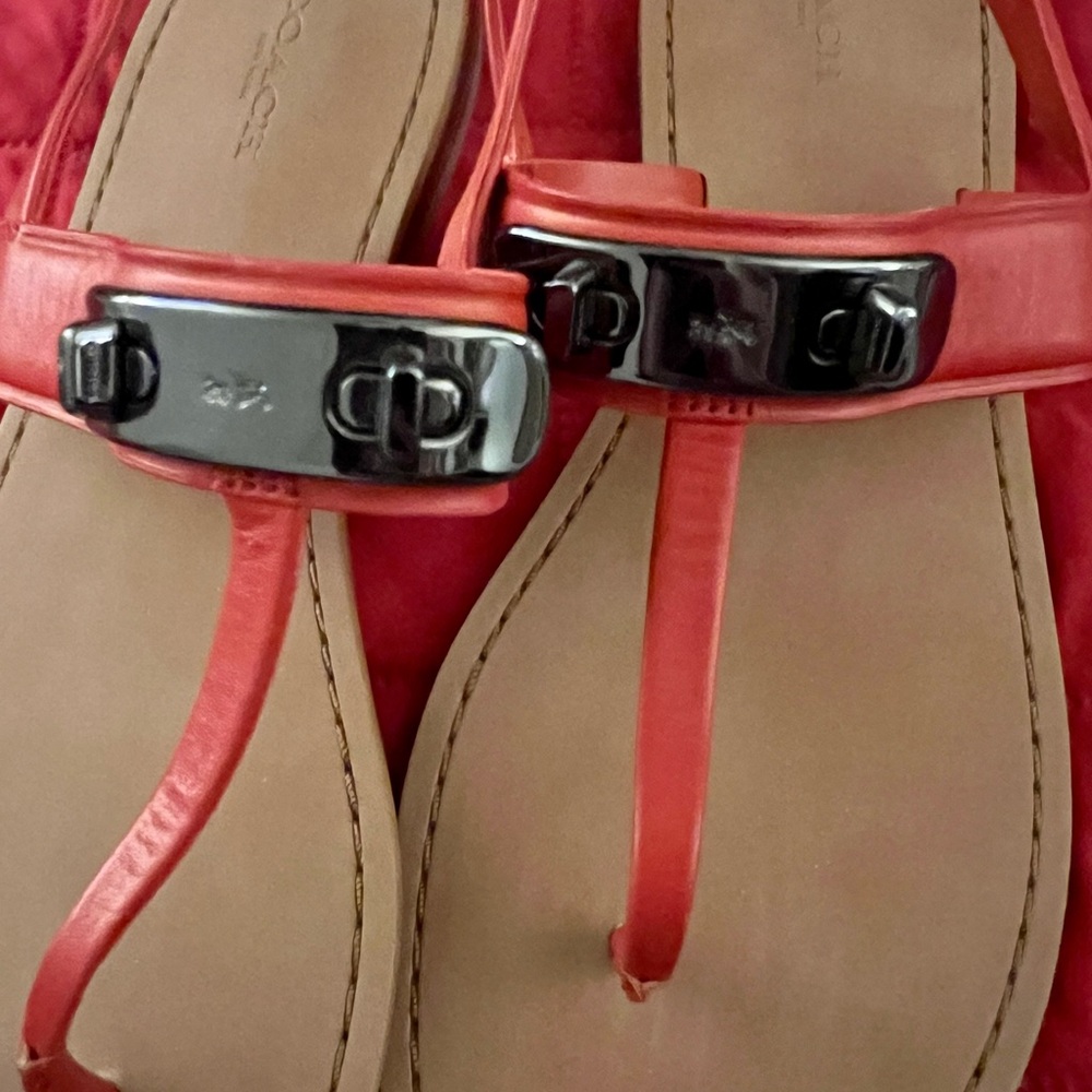 Coach Gracie Swagger Orange-Rust Orange Turn Lock Leather T Strap Sandals. - Picture 2 of 14